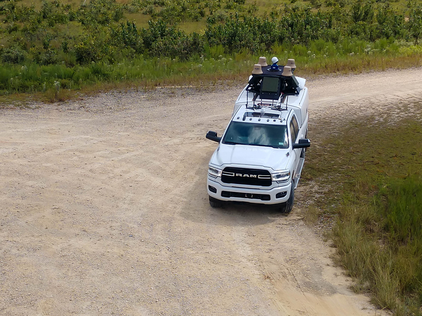 Silent Archer On-the-Move configuration driving on dirt road detecting UAS